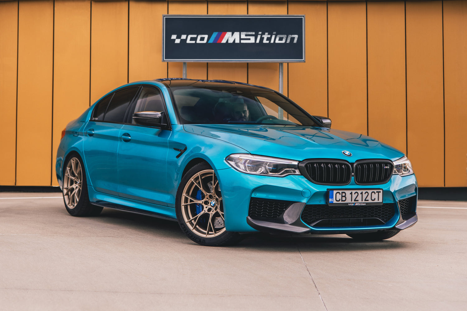 com5ition bmw m5 competition with custom carbon style license plate frame