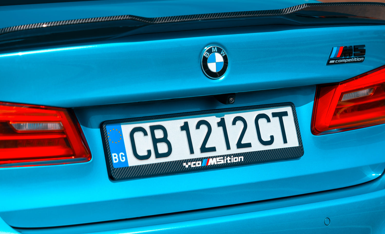 com5ition owner first carbon style license plate frame